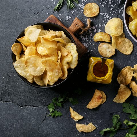 Bowl,Of,Home,Made,Potato,Chips,Served,With,Mustard,,Rosemary,